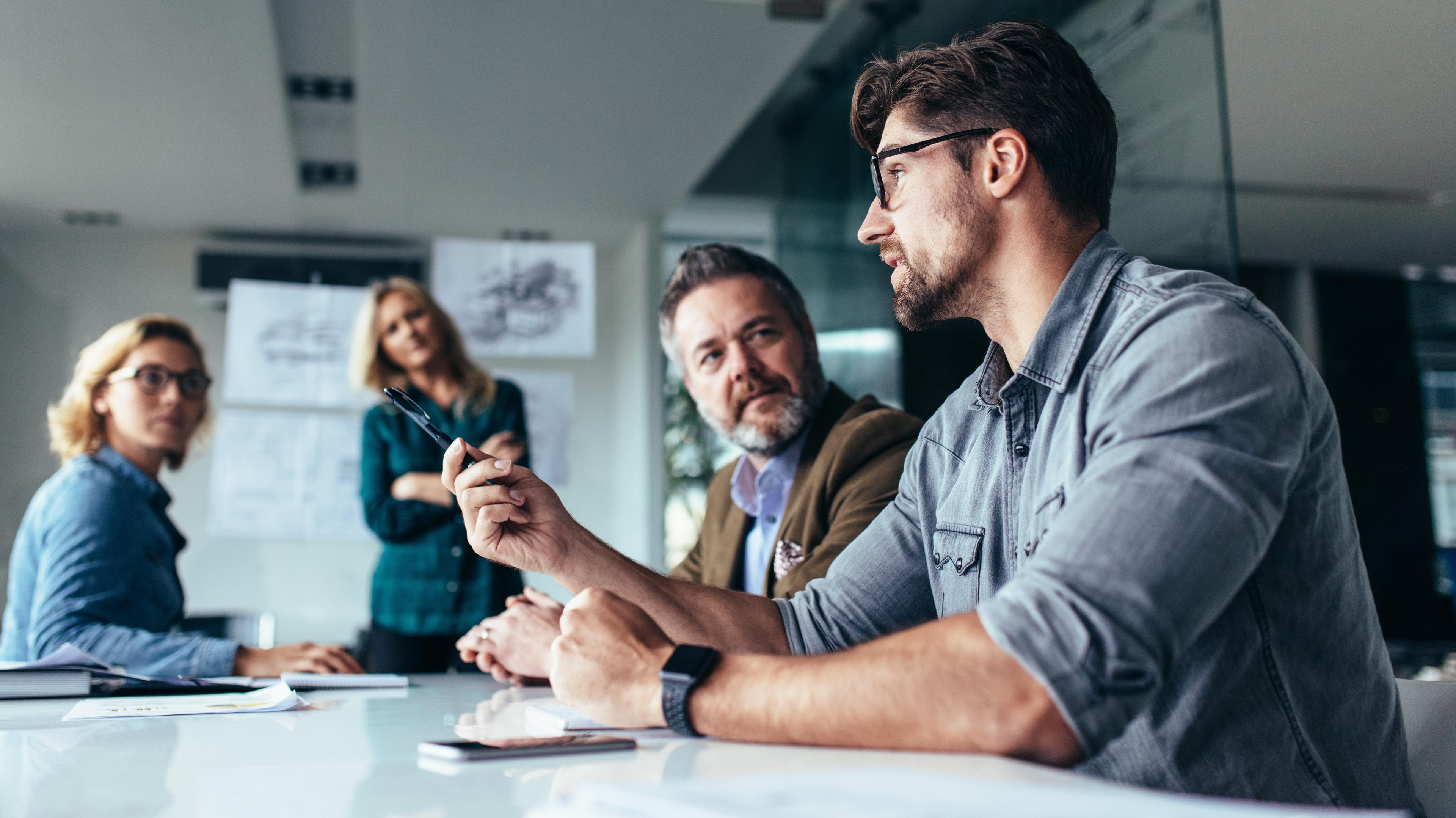 team listening a coworkers and his ideas